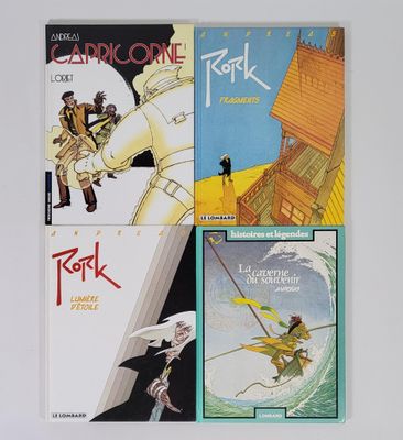 trois livres posés sur une surface blanche ; l'un est un livre et l'autre est une bande dessinée