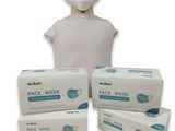 a manne head with three boxes of face masks on it