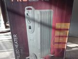 boxed box of a portable heater sitting on the floor in front of a table