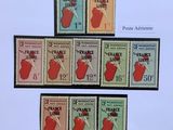 four different stamps of different colors and sizes on a white background