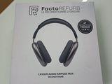 packaging of a pair of headphones sitting on top of a glass table
