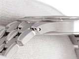 a close up of a watch that is being held by someone