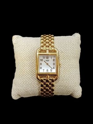 HERMÈS : Montre en or jaune 18K (750/oo), collection "Cape C…