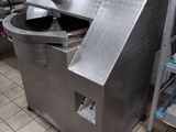 a large machine that is sitting in a kitchen
