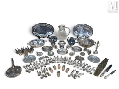 a lot of silver items that are on the table