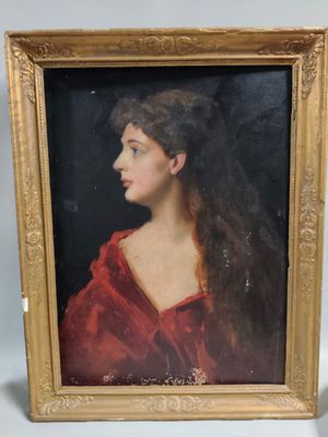 portrait of a woman in a red dress by a gold frame