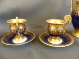 two cups and a saucer on the table