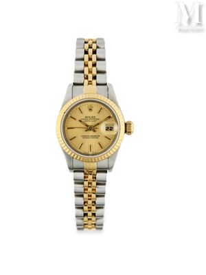 une montre Rolex pour femme avec un cadran bicolore en or