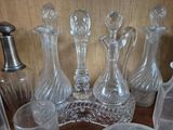 a lot of glass items sitting on a table