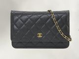 Portefeuille-sac Chanel en cuir d'agneau matelassé noir