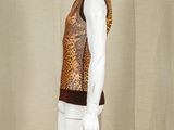 an image of a mannequin wearing a leopard print top and white pants