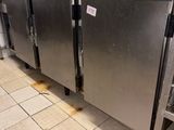 many plates stacked on top of each other in the kitchen