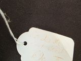 a tag that has been written on a piece of fabric