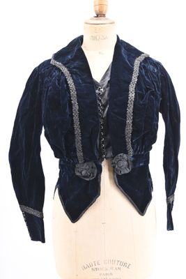 an image of a blue velvet jacket on a mannequin