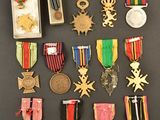many medals and medals on display on a table