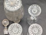 a lot of glass items that are sitting on a table