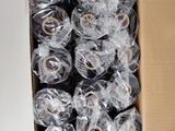 a box full of rolls of tape sitting on a table
