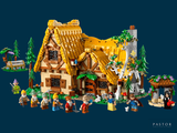 many legos that are standing in front of a house