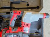a tool box filled with tools like drill and hammers