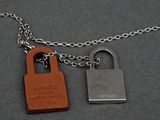 a close up of a chain with a padlock on it