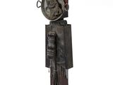 a sculpture of a man with a hat on it ' s head