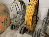 a lot of different types of hoses on the floor