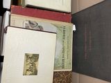 a box full of books sitting on top of a table