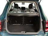 the back of a car with the trunk open and the seats down