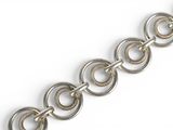 a close up of a metal chain with rings on it