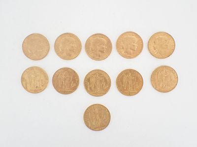 a lot of coins that are arranged in the shape of a heart
