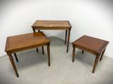 three small tables and a small table in a room