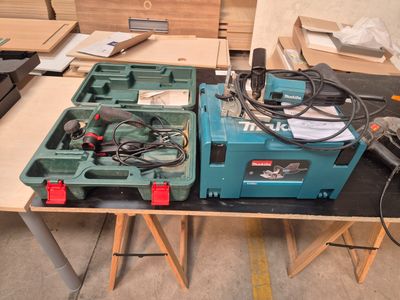 a table with tools on it in a room