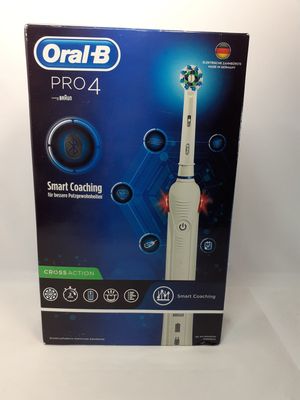 La boîte de la brosse à dents électrique est ouverte et prête à l'emploi