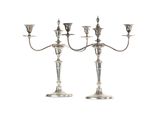 paire de chandeliers plaqués argent à quatre branches
