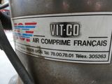 a close up of a metal container with a sticker on it