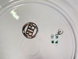 a close up of a plate with a number on it