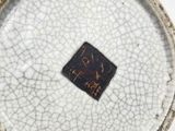 an image of a close up of a vase with a cracky surface