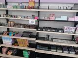 many shelves with various cosmetics products on them in a store