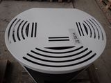 a white table with a black and white design on it