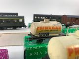 many different types of toy trains on the table