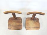 pair of vintage wooden chairs with wooden seat and backrests