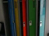 several lockers are lined up in a row in a room