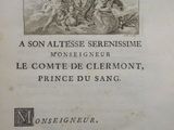 an old book with a black and white drawing of a man on a horse and a woman on a horse
