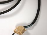 a black cord connected to a brown cord on a white surface