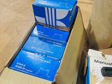 several boxes are stacked on top of each other in a warehouse