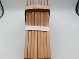 a bunch of knives in a wooden holder on a table