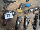 a lot of tools that are sitting on a table