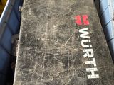 a box full of tools that are sitting on the floor