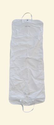 a white bag that has a white handle on it