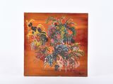 un tableau représentant un bouquet de fleurs accroché au mur